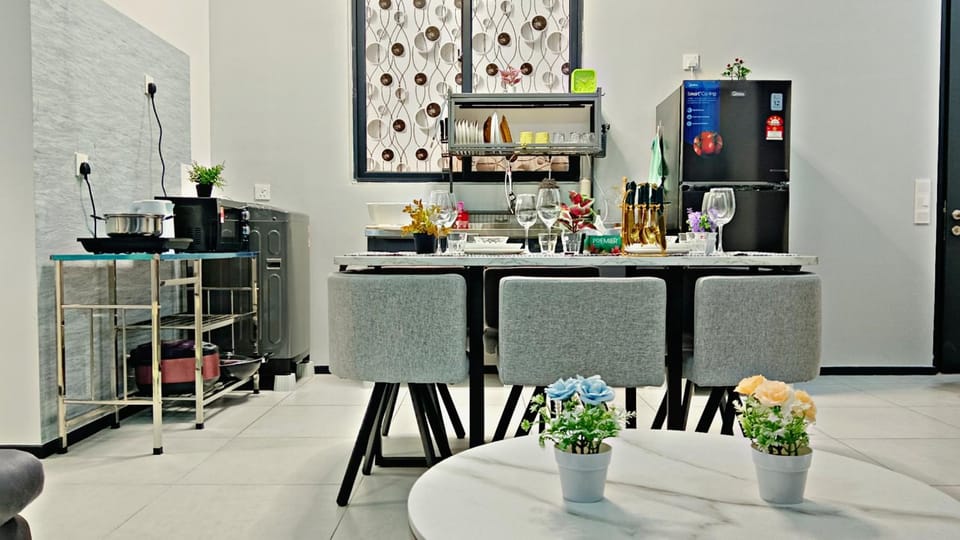 Dining area, microwave, stove, washing machine, kitchen