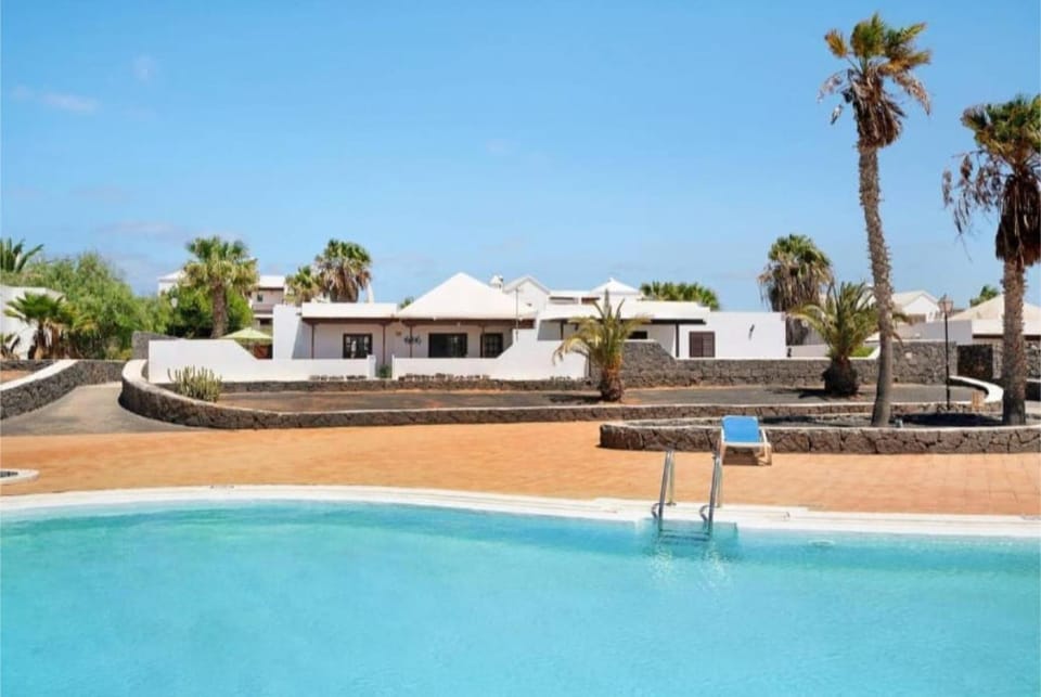 Property building, Living room, Swimming pool