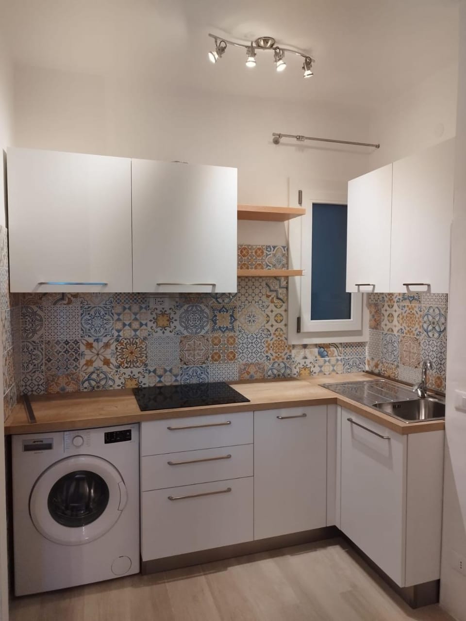 Kitchen or kitchenette, stove, washing machine