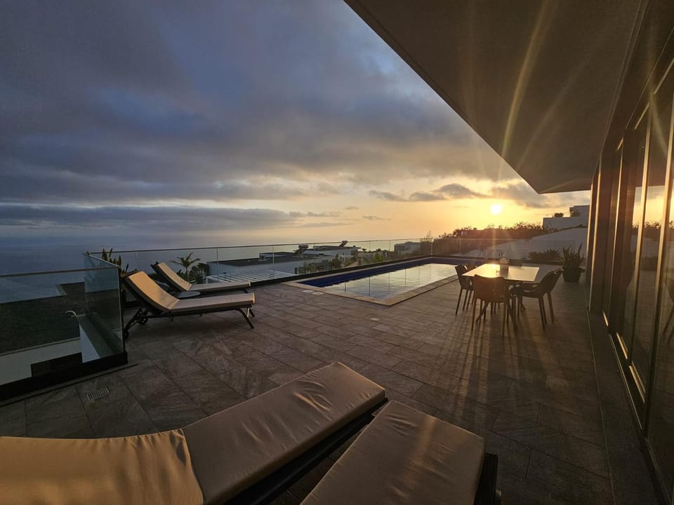 Patio, Balcony/Terrace, Swimming pool, Sunset, sunbed