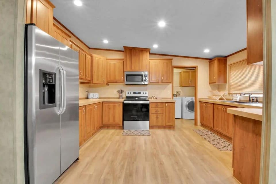 Kitchen or kitchenette, dishwasher, oven, stove, toaster