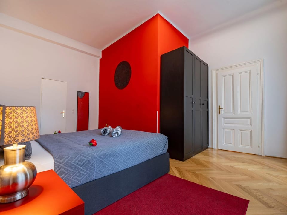 Bed, flat iron, towels, wardrobe