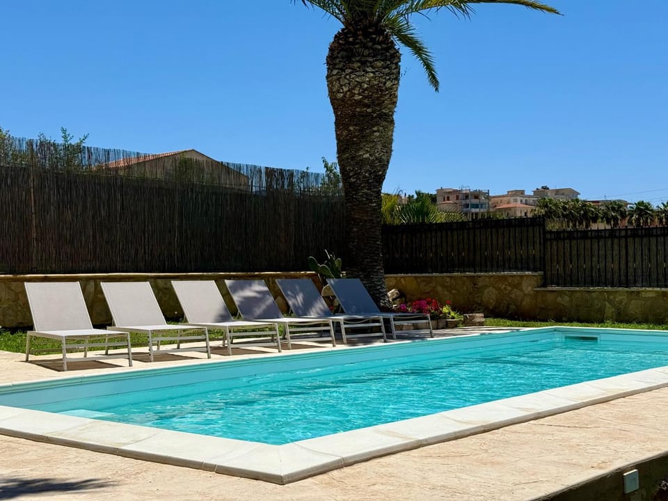 Swimming pool, sunbed