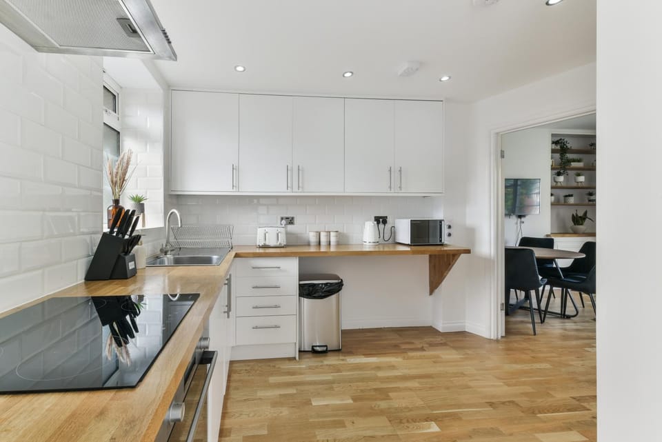 Kitchen or kitchenette, oven, stove, toaster