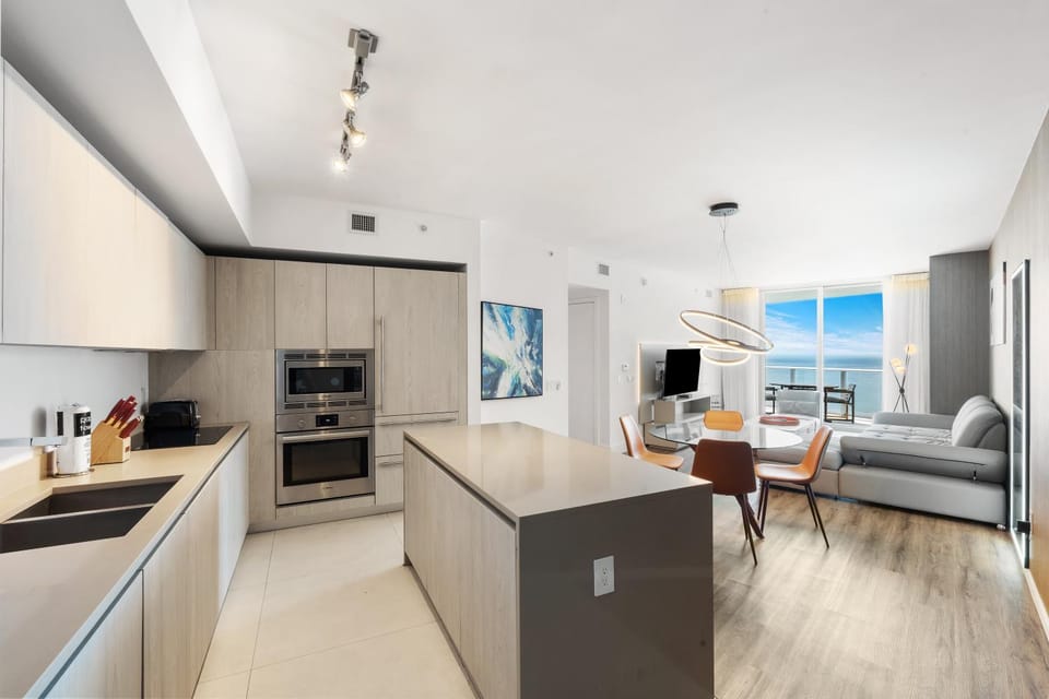 Kitchen or kitchenette, Living room, Seating area, Dining area, oven, stove, toaster