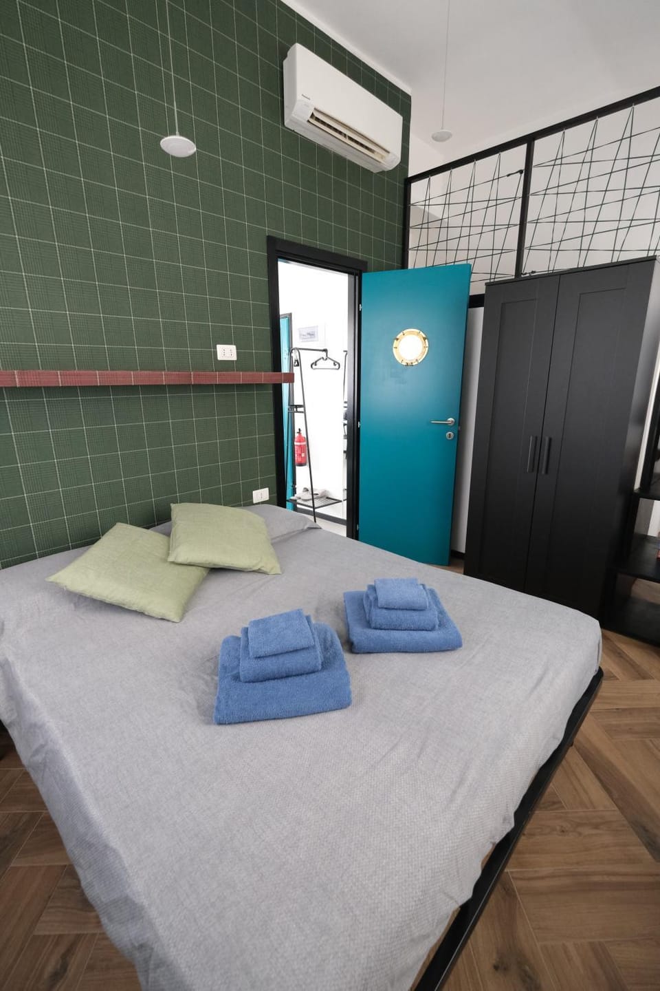 Bed, Photo of the whole room, Bedroom, towels, air conditioner