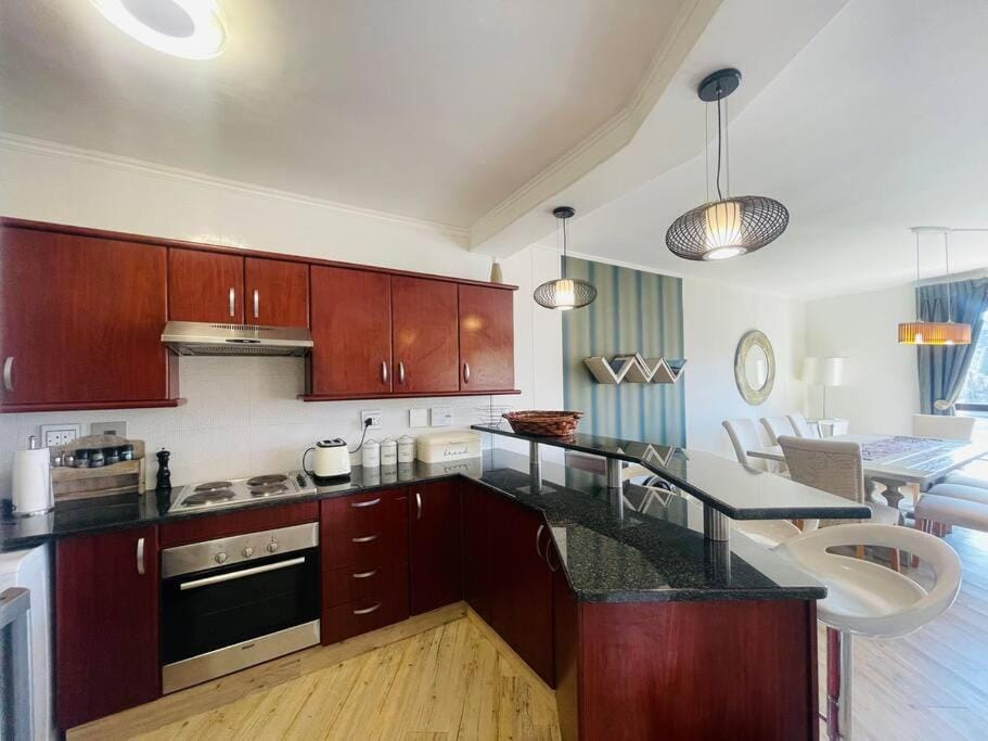 Kitchen or kitchenette, oven, stove