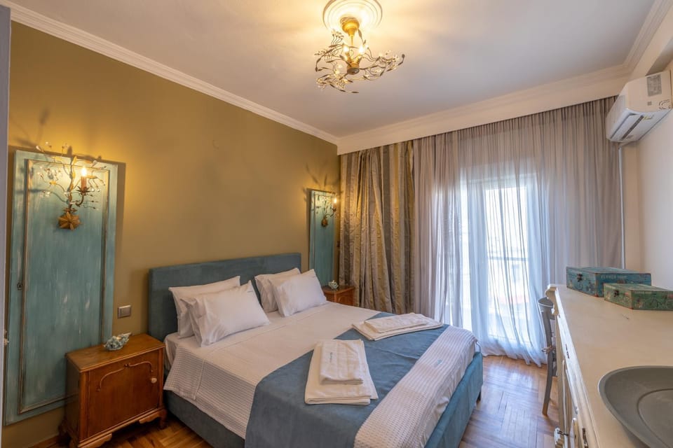 Bed, Photo of the whole room, Bedroom, towels, air conditioner