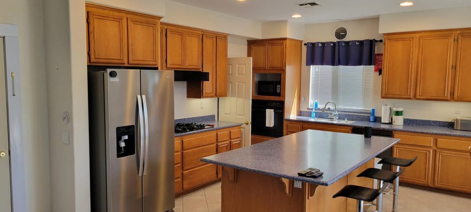 Kitchen or kitchenette, dishwasher, oven, stove, toaster