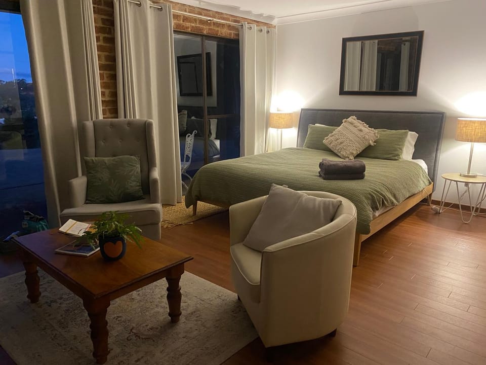 Bed, Living room, Seating area, Bedroom