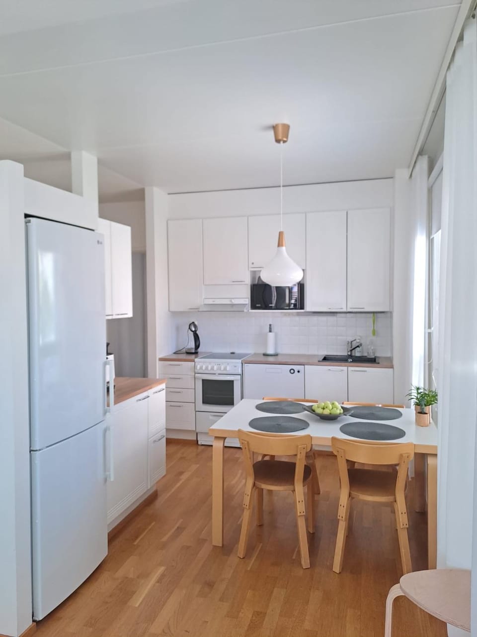 Dining area, dishwasher, oven, toaster, kitchen