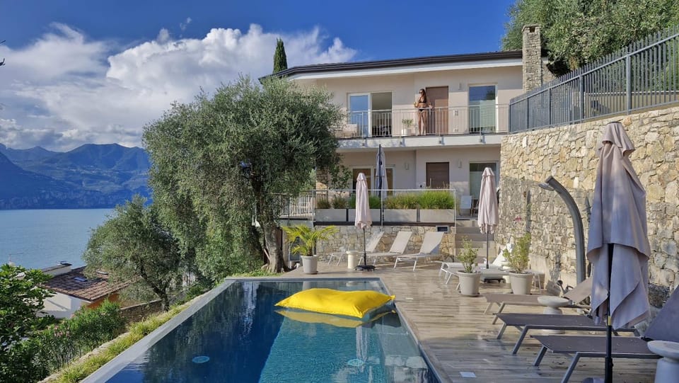 Property building, Day, Natural landscape, Balcony/Terrace, Lake view, Mountain view, Pool view, Swimming pool, sunbed