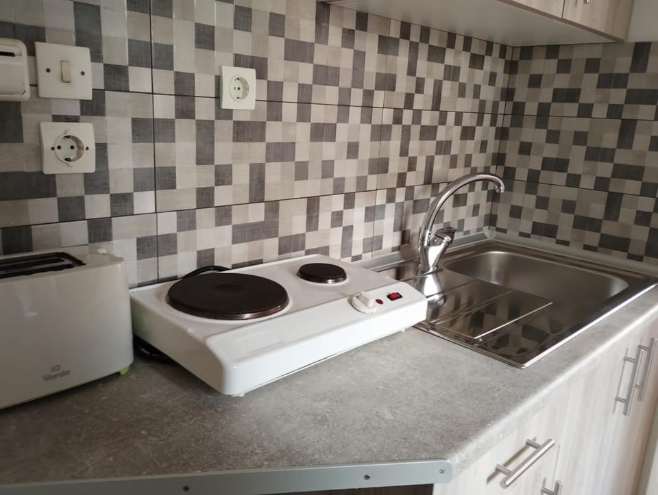 Kitchen or kitchenette, stove