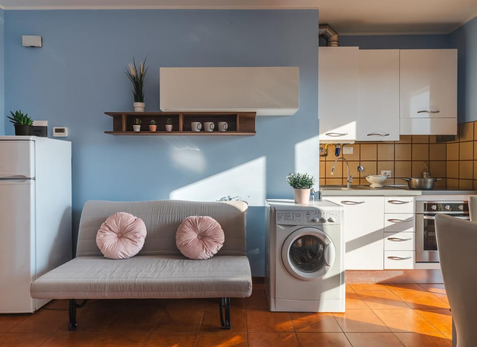 Kitchen or kitchenette, Living room, Seating area, oven, stove, washing machine