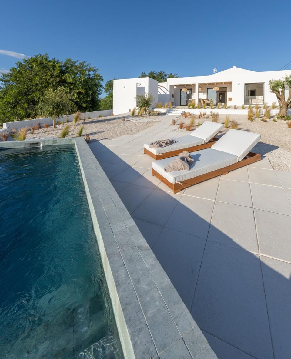 Swimming pool, sunbed