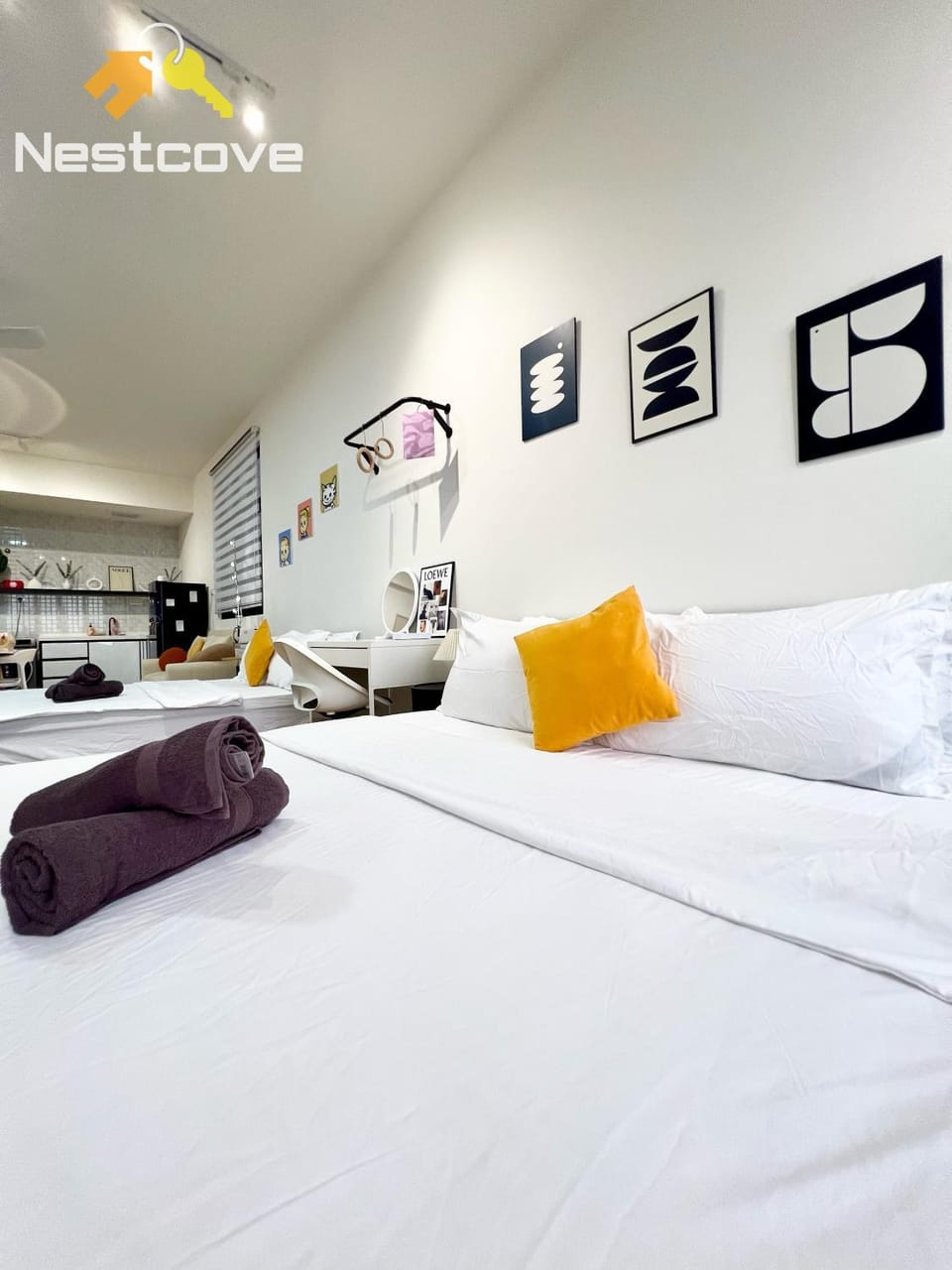 Bed, Photo of the whole room, Bedroom, Text overlay, towels