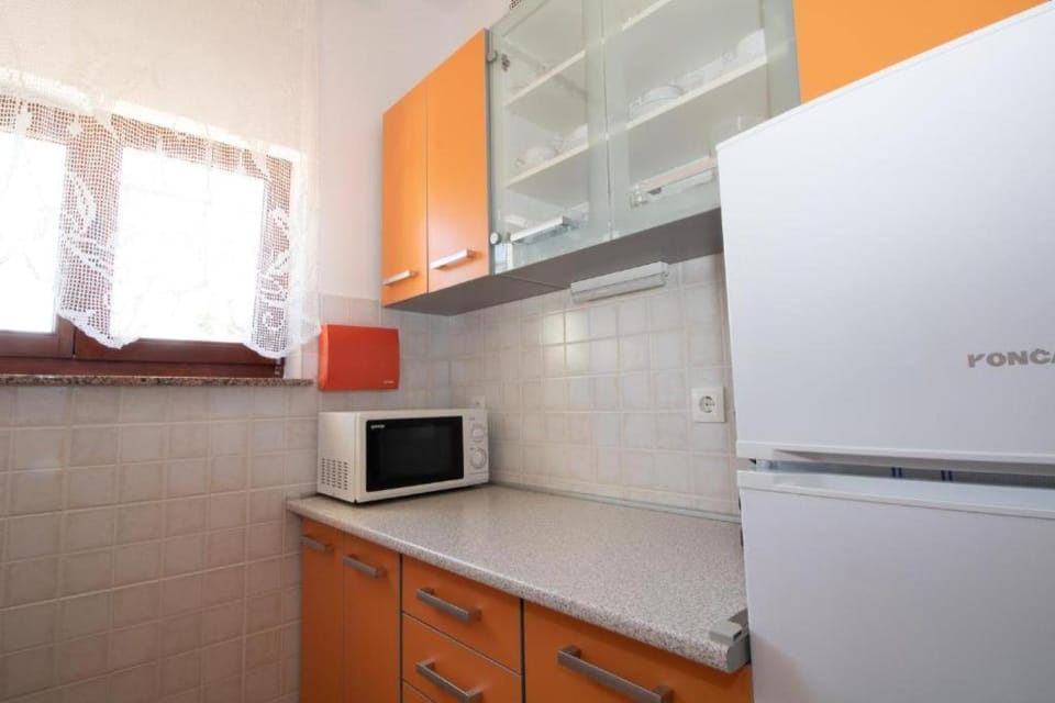 Kitchen or kitchenette, microwave