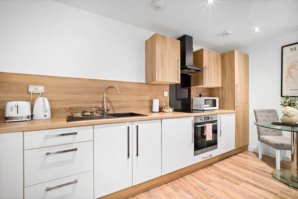Kitchen or kitchenette, oven, stove, toaster