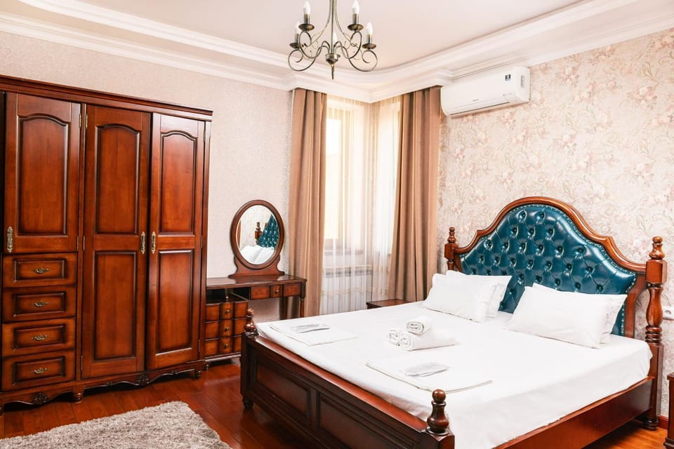 Bed, Bedroom, towels, wardrobe, air conditioner