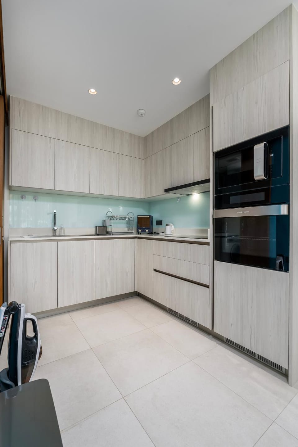 Kitchen or kitchenette, dishwasher, oven, stove