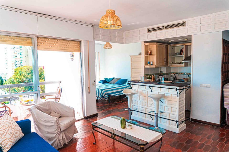 Bed, Kitchen or kitchenette, Seating area