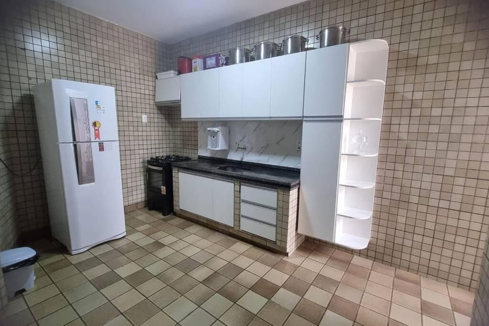 Kitchen or kitchenette, oven, stove