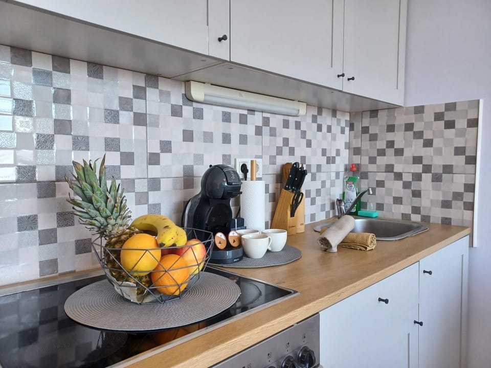 Kitchen or kitchenette, stove