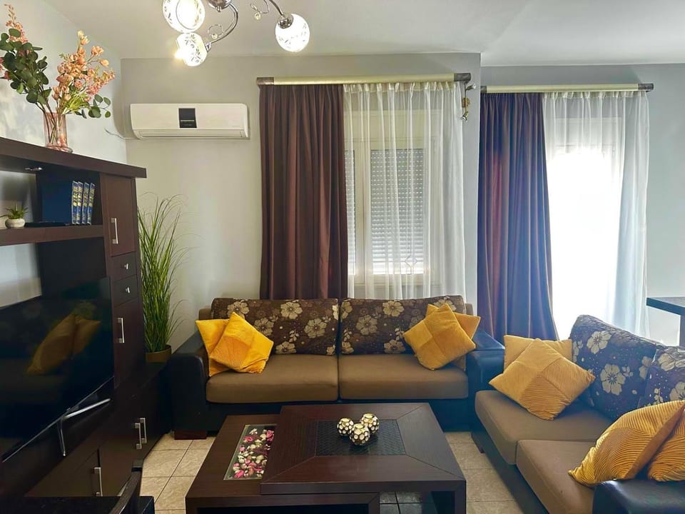 Library, TV and multimedia, Living room, Seating area, air conditioner