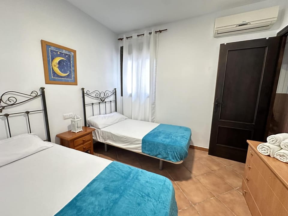 Bed, Photo of the whole room, Bedroom, towels, air conditioner