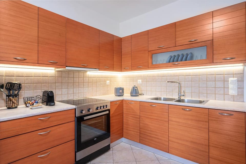 Kitchen or kitchenette, oven, stove, toaster