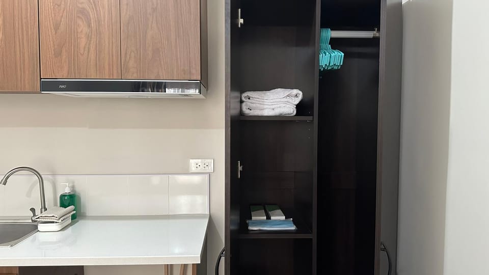 Kitchen or kitchenette, towels, wardrobe
