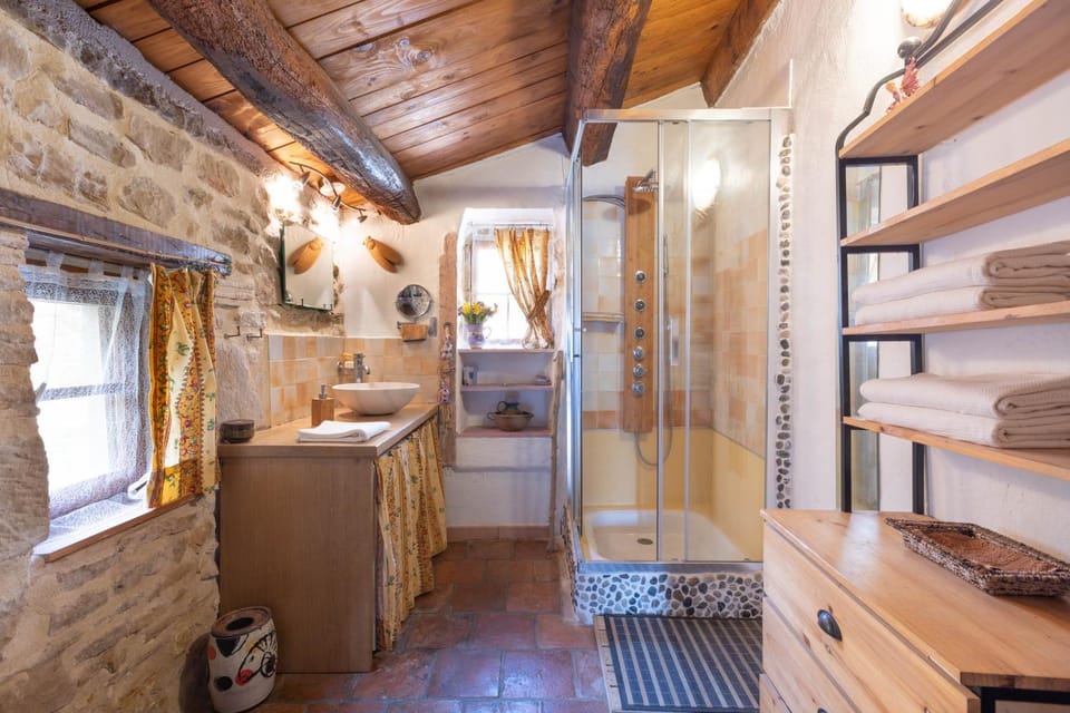 Bathroom, hair dryier, towels, washing machine