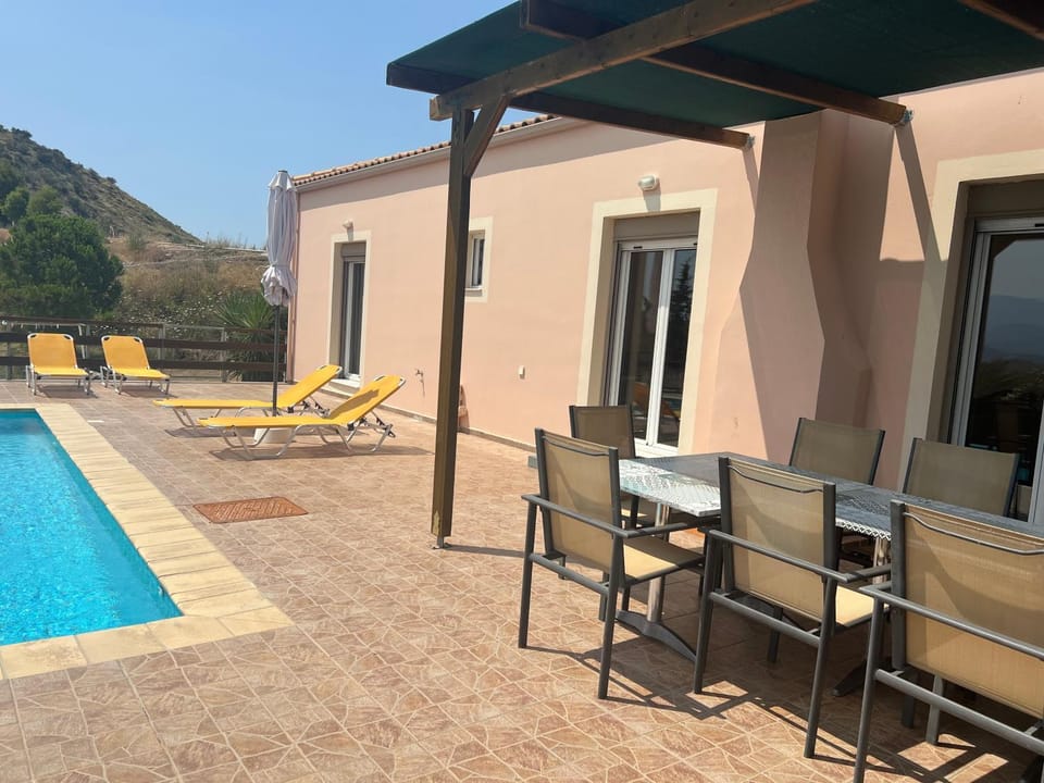 Property building, Patio, Day, Natural landscape, Dining area, Pool view, Swimming pool, sunbed