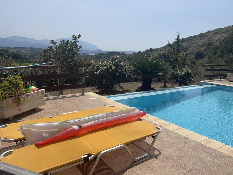 Patio, Day, Natural landscape, Mountain view, Pool view, Swimming pool, sunbed