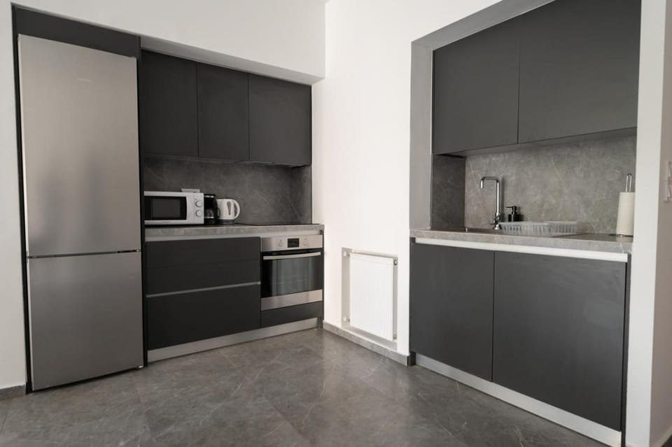 Kitchen or kitchenette, oven, stove