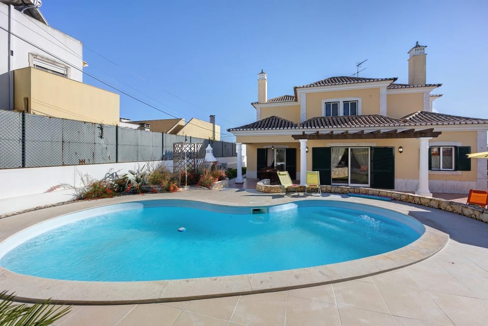 Property building, Living room, Swimming pool