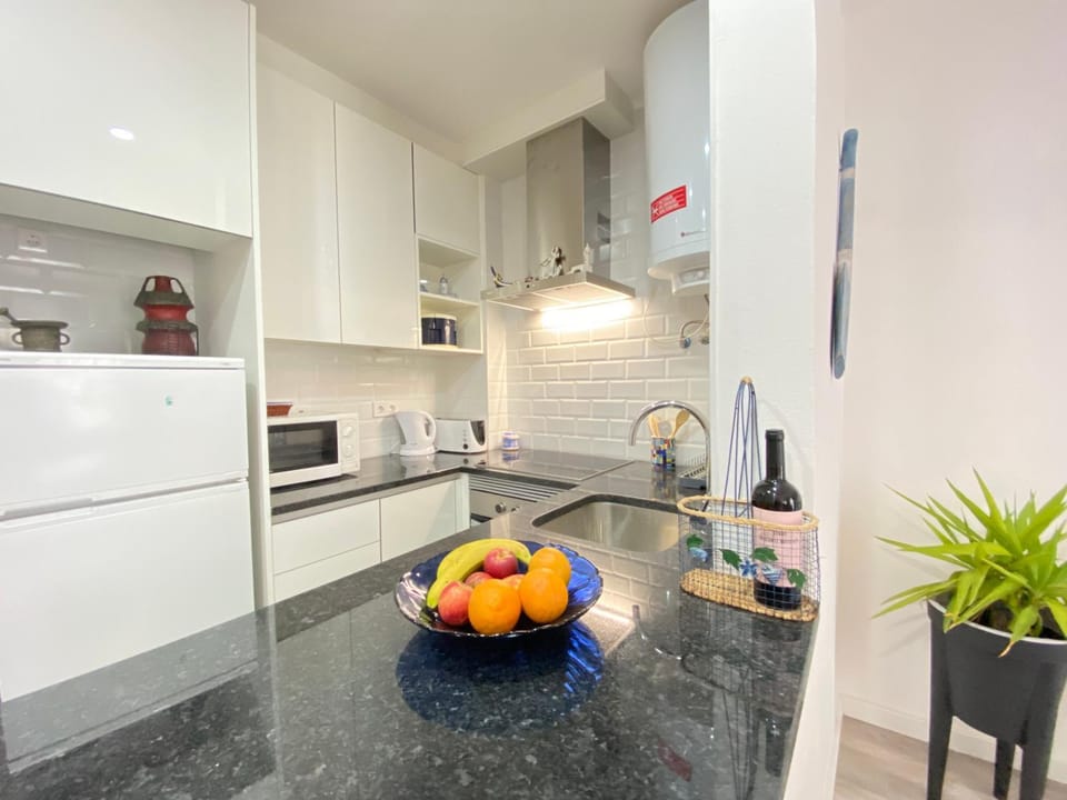 Kitchen or kitchenette, oven, stove, toaster