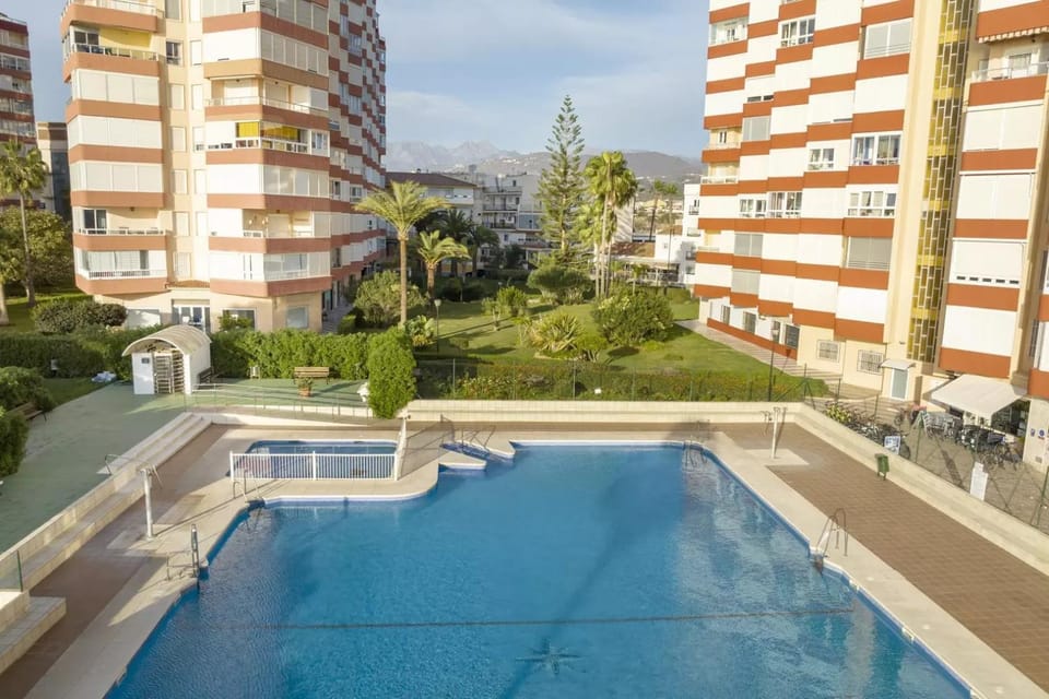 Property building, Living room, Swimming pool