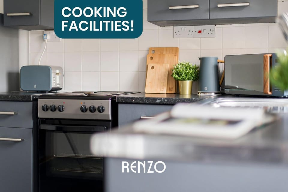 Kitchen or kitchenette, oven, stove, toaster