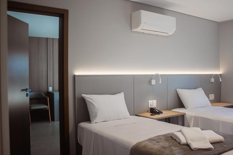 Bed, Photo of the whole room, Bedroom, towels, air conditioner