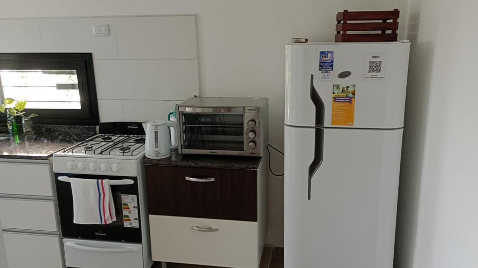 Kitchen or kitchenette, oven, stove