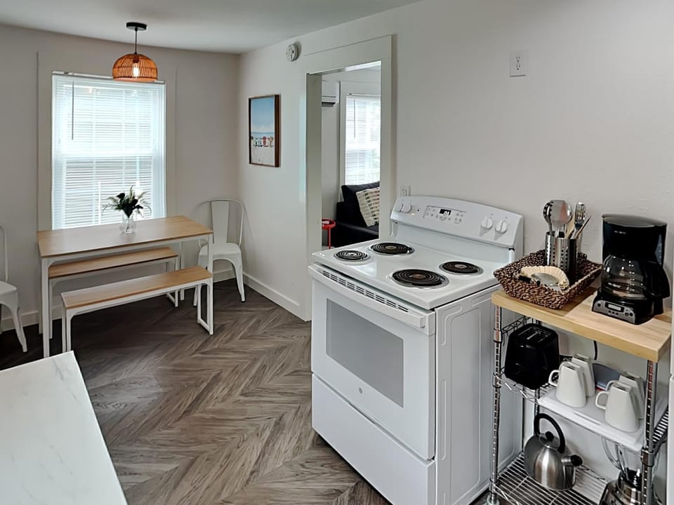 Kitchen or kitchenette, Seating area, Dining area, furniture, oven, stove, kitchen