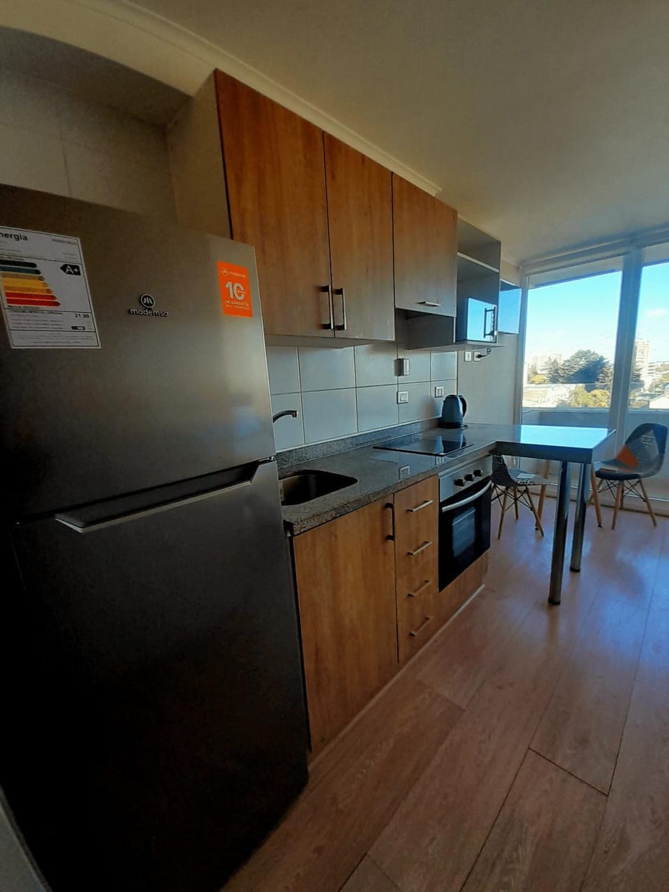 Kitchen or kitchenette, oven