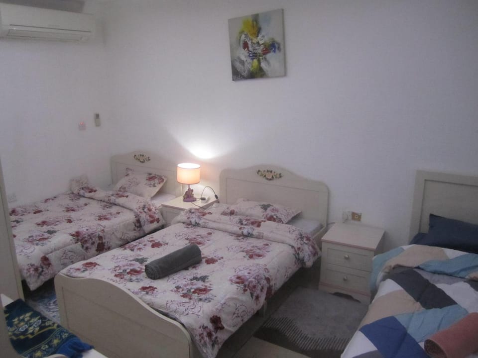 Bed, Photo of the whole room, Bedroom, towels, air conditioner
