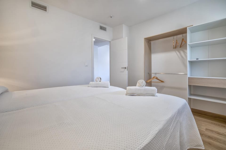 Bed, Bedroom, towels, wardrobe, air conditioner