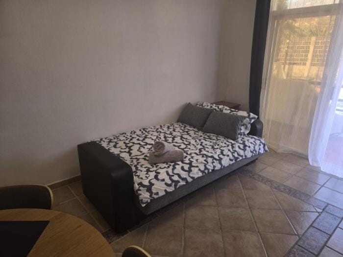 Bed, Living room, Photo of the whole room, Seating area, Bedroom