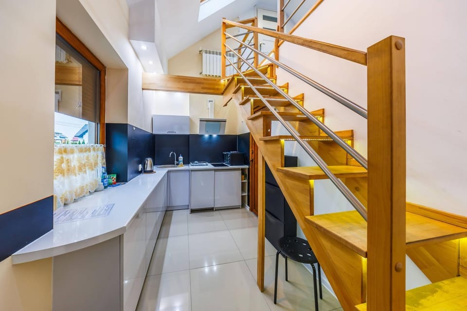 Kitchen or kitchenette, dishwasher, minibar, oven, stove