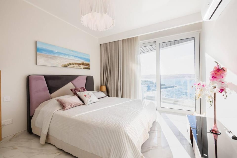 Ivory Suite seafront with views!- Fl 12 by Homely Apartment in Saint Paul's Bay