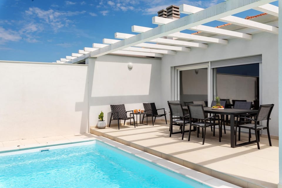 Patio, Seating area, Pool view, Swimming pool, sunbed
