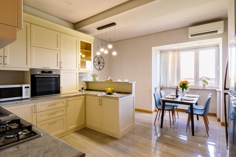 Dining area, minibar, oven, stove